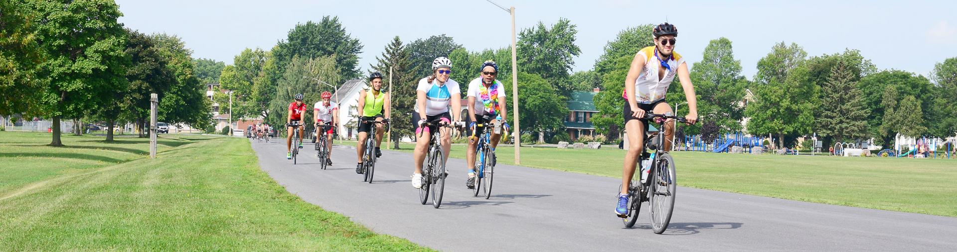 Biking along waterfront pathway