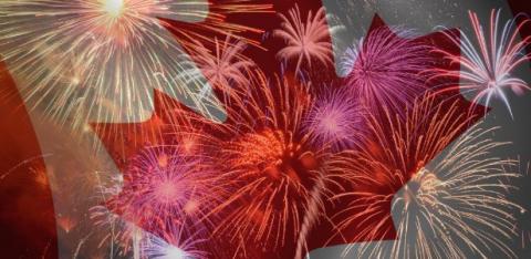 Fireworks on top of a canada flag