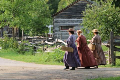 Pictures of ladies walking at Upper Canada Village